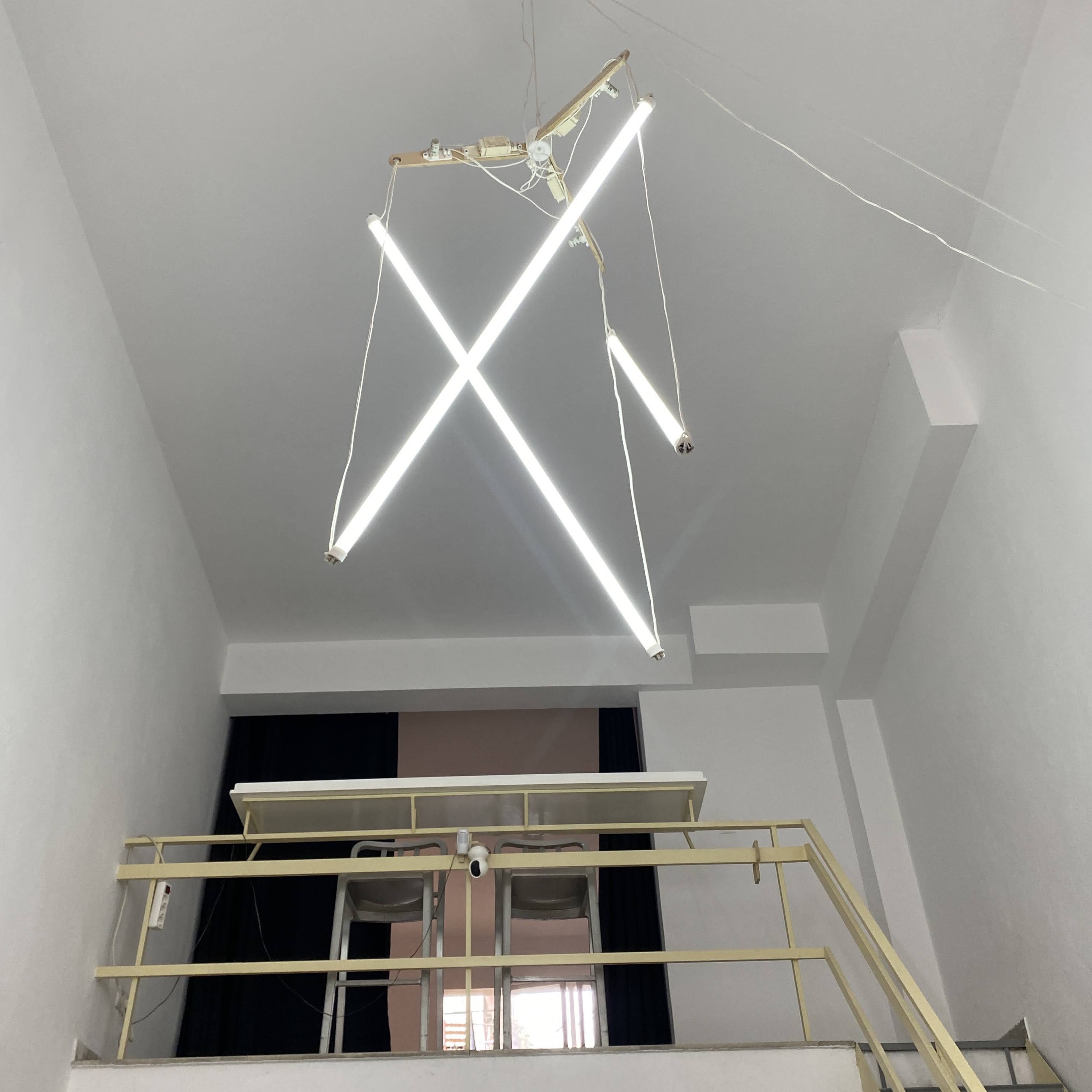 Studio stairwell with X lighting installation