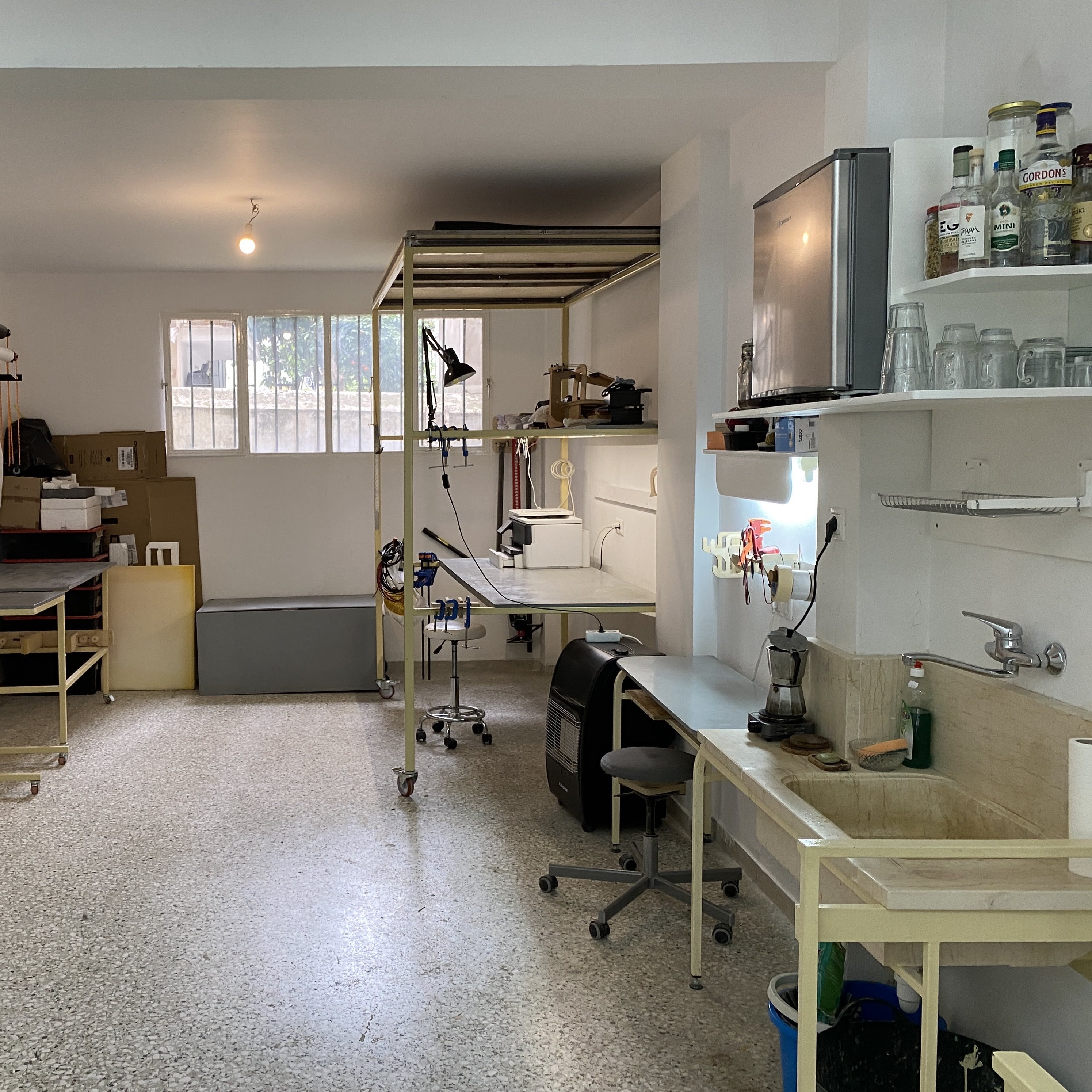 Studio main floor with kitchenette