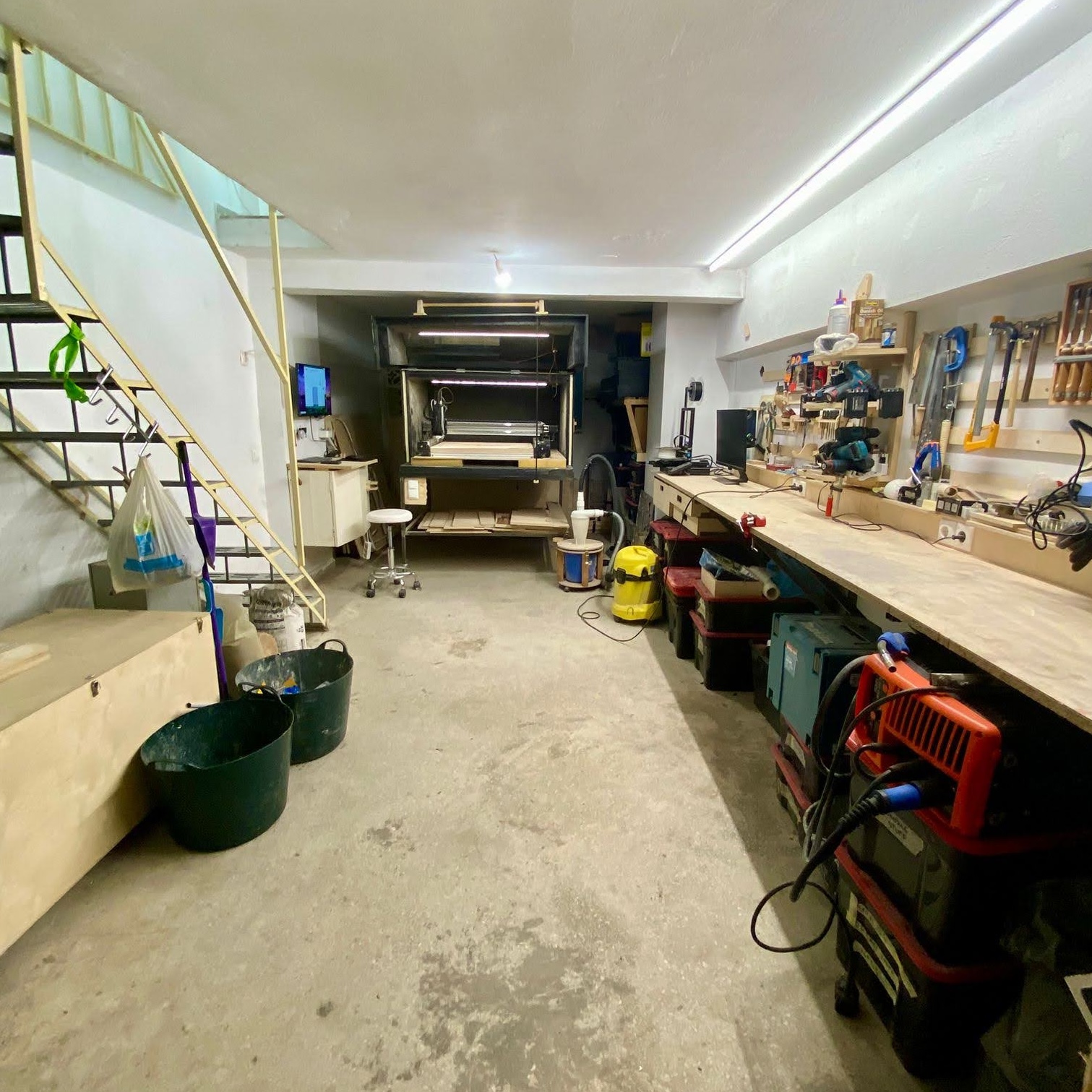 Basement workshop with CNC machine